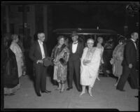 Mr. and Mrs. Charles Henry Thompson and Mrs. Osta Deardorff arrive at the opera after a meal at the Biltmore, Los Angeles, circa 1926