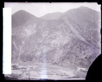 San Gabriel Canyon wall just before an explosion during construction of San Gabriel Dam, Los Angeles County, 1928