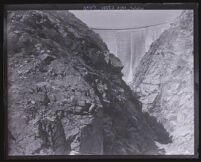 View from the canyon floor looking up at completed Pacoima Dam, Los Angeles County, circa 1928