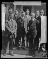 Henry Ford, his attorney William J. Cameron, and Harry Dunn with several unidentified men, Detroit, 1927