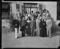 John S. McGroarty with performers in Spanish style costumes, Southern California, 1920-1940