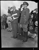 Governor Merriam and General Seth Howard salute during Armistice Day celebration, Los Angeles, 1934