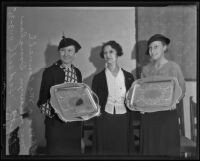 Verna McConnell and Dorothy Hadsell hold silver trays that Mrs. Selwyn Douglas made, Los Angeles, 1935