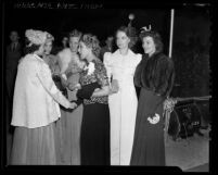 Actresses Mary Pickford, Lillian Gish and Louise Campbell with three other women at film premiere of "The Star Maker," 1939