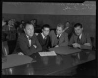 Attys. Leonard Wilson and Charles Rude with convicted murderer Louis R. Payne and his father Lucius Payne, Los Angeles, 1934-1935