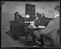 Charlotte Ethel Lee takes the witness stand beside Judge Charles S. Burnell, Los Angeles, 1927