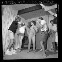 Group of teenagers dancing the Watusi in Los Angeles, Calif., 1965