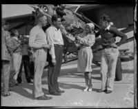 R. V. "Doc" Howard and Gwen Seager bid farewell to Loren Mendell and Pete Reinhart before their takeoff, Los Angeles, 1929-1930