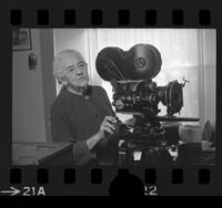 Leontine (Lulu) Phelan with a hand-cranked Bell & Howell motion picture camera in Santa Barbara, Calif., 1973