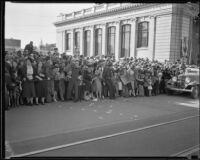 Spectators on the route of the Tournament of Roses Parade, Pasadena, 1933