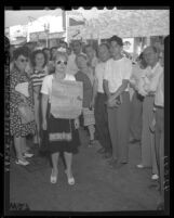 Frances Sobel with picket sign calling for her husband to grant her divorce, Calif., 1946