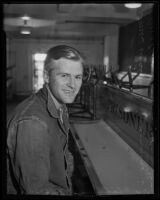 James Wilson, identified as escaped prisoner Buster Nichols from State reformatory in Oklahoma, Los Angeles, 1935