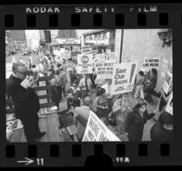 Leonard Levy and garment workers picketing against clothing imports at 8th and Broadway in Los Angeles, Calif., 1974