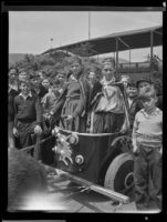 Harold and Richard Smith and the other boys of the Y.M.C.A. Pioneer clubs prepare for a chariot race, San Dimas, 1936