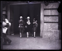 Harriet Binney and two friends exit a court house, Los Angeles, 1929