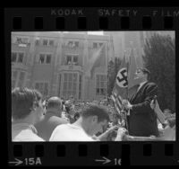 John Coffman, president of Committee for Rhodesian Independence in Support of Ian Smith, speaking to crowd at UCLA, 1967