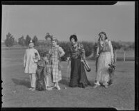 Mmes. C. E. Emmons, Gordon Campbell, E. H. Veblen and Frank Daugherty in hi-jinks attire at the Brentwood Country Club, Los Angeles, 1935