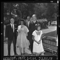 Actress Dale Evans arriving with her children Roy Jr. and Dodie to funeral for her daughter Debbie Lee, Calif., 1964