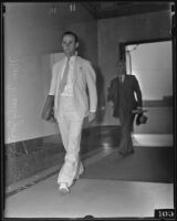 Attorney William Mosely Jones walking with briefcase, Los Angeles, 1935