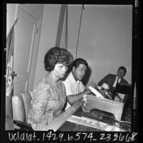 Cesar Chavez and Ophelia Diaz at press conference announcing break off of negotiations with the Di Giorgio Corp., Calif., 1966