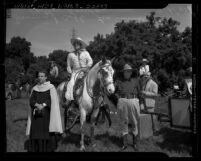 Actor Leo Carrillo and Irvin S. Cobb at Palm Sunday service for El Camino Real Horse Trails Association on Providencia Rancho, Calif., 1941