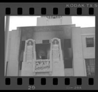 Fireman inspecting fire damage on west façade of Los Angeles Central Library, Calif., 1986