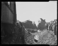 Spectators look on railroad wreckage, Glendale, 1935