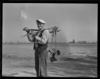 Farmworker in an empty field at the Los Angeles County Farm, Downey, 1920-1939