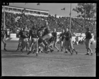 Los Angeles Bulldogs play Cleveland Rams at Gilmore Stadium, Los Angeles, 1938