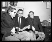 William Talman, James Baker with attorney C. Richard Maddox during booking for marijuana possession in Los Angeles, Calif., 1960