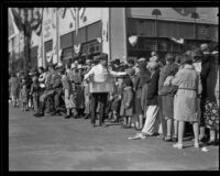 Food vendor selling breakfast to spectators on the route of the Tournament of Roses Parade, Pasadena, 1932