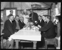 Police officers and prison guards are served lunch at open-air prison camp, Malibu, 1921