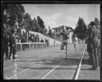 John Powers, Occidental College student, running a race, Los Angeles[?], circa 1924