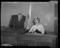 Aimee Semple McPherson-Hutton sits on the witness stand and Superior Judge Leon R. Yankwich presides, Los Angeles, 1934