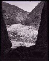 Dry stream bed at the San Gabriel Canyon Dam site, Los Angeles County, 1920s