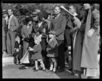 Family and other spectators at the Tournament of Roses Parade, Pasadena, 1932