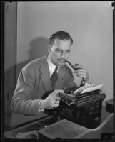 Portrait of author and director Emory Johnson at his typewriter, Los Angeles, 1940