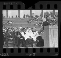 Dr. Martin Luther King Jr. speaking at civil rights rally at Los Angeles Coliseum, 1964