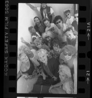 Casting director, Janet Cunningham, with a group of punk movie extras, Los Angeles, Calif., 1984