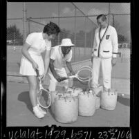 Billie Jean Moffitt King, Pancho Segura, and Stan Smith at tennis clinic in Los Angeles, Calif., 1966