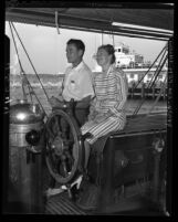 Errol Flynn and wife Nora Eddington Flynn on boat in Santa Monica, Calif., 1946