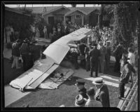 Plane crashes in front yard on Van Ness and Slauson, Los Angeles, 1935