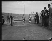 Redlands University runners Marvin Vancil and Allen Griffin cross the finish line at the Rose Bowl, Pasadena, 1933