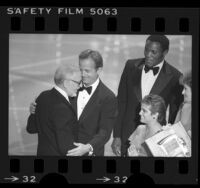 Peter Ueberroth, Rafer Johnson and Mary Lou Retton presenting David L. Wolper with Emmy Award, 1984