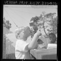 Children eating at Head Start program in Los Angeles, Calif., 1966