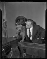 Ernest Osborne and his dog King on the witness stand, Los Angeles, 1939