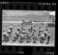 Group portrait of Totally Confident Disabled Drill Team at Cal State Northridge, Calif., 1984