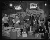 Relief workers in a warehouse full of provisions after the Long Beach earthquake, Southern California, 1933