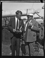 Crew members Bernt Balchen and Martin Ronne stand on the deck of the C. A. Larsen, Los Angeles, 1928