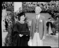 University of Southern California graduation, woman graduate and older man, Los Angeles Memorial Coliseum, Los Angeles, 1934